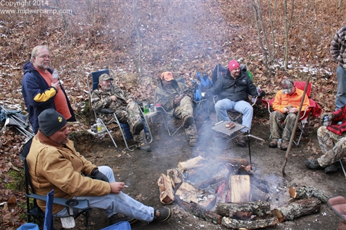 Sitting around a fire at Deer Camp