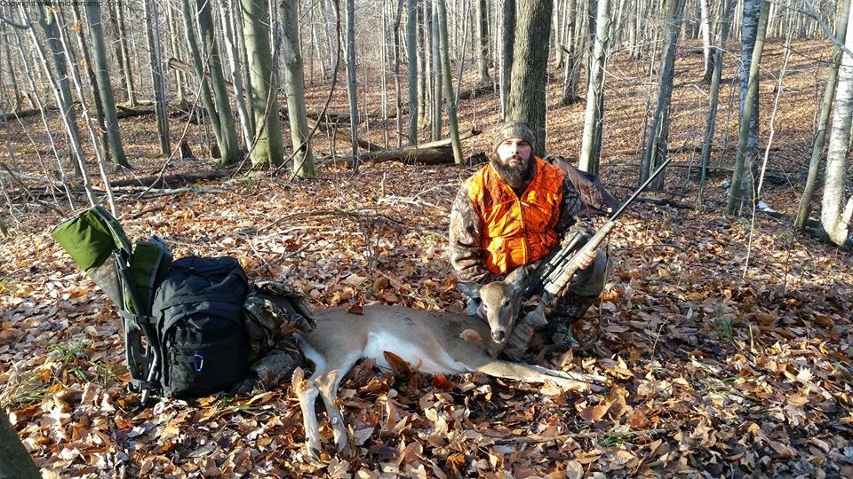 John with his Doe kill on Opening Morning 2015