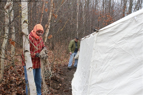 Attaching ropes to the tent eaves