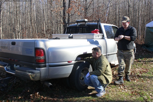 Kruger's truck with a flat tire