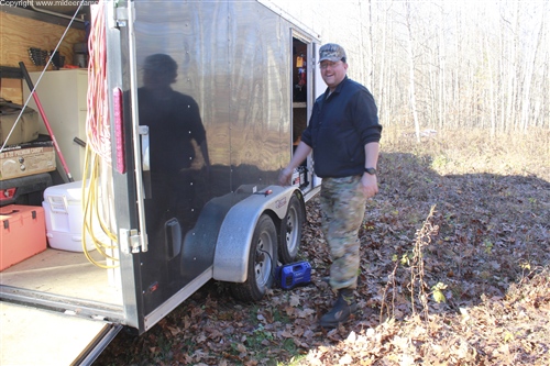 Kruger's trailer with a flat tire