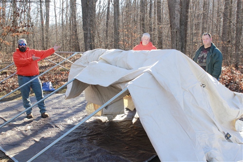 John setting up tent